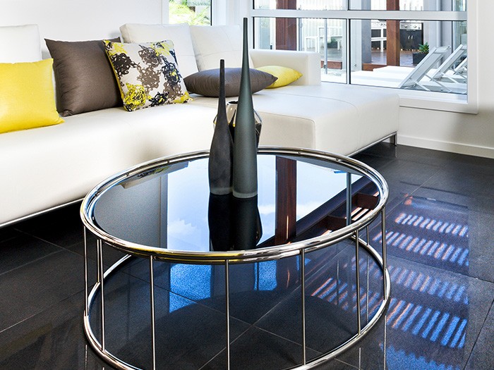 Coffee table with chrome features.
